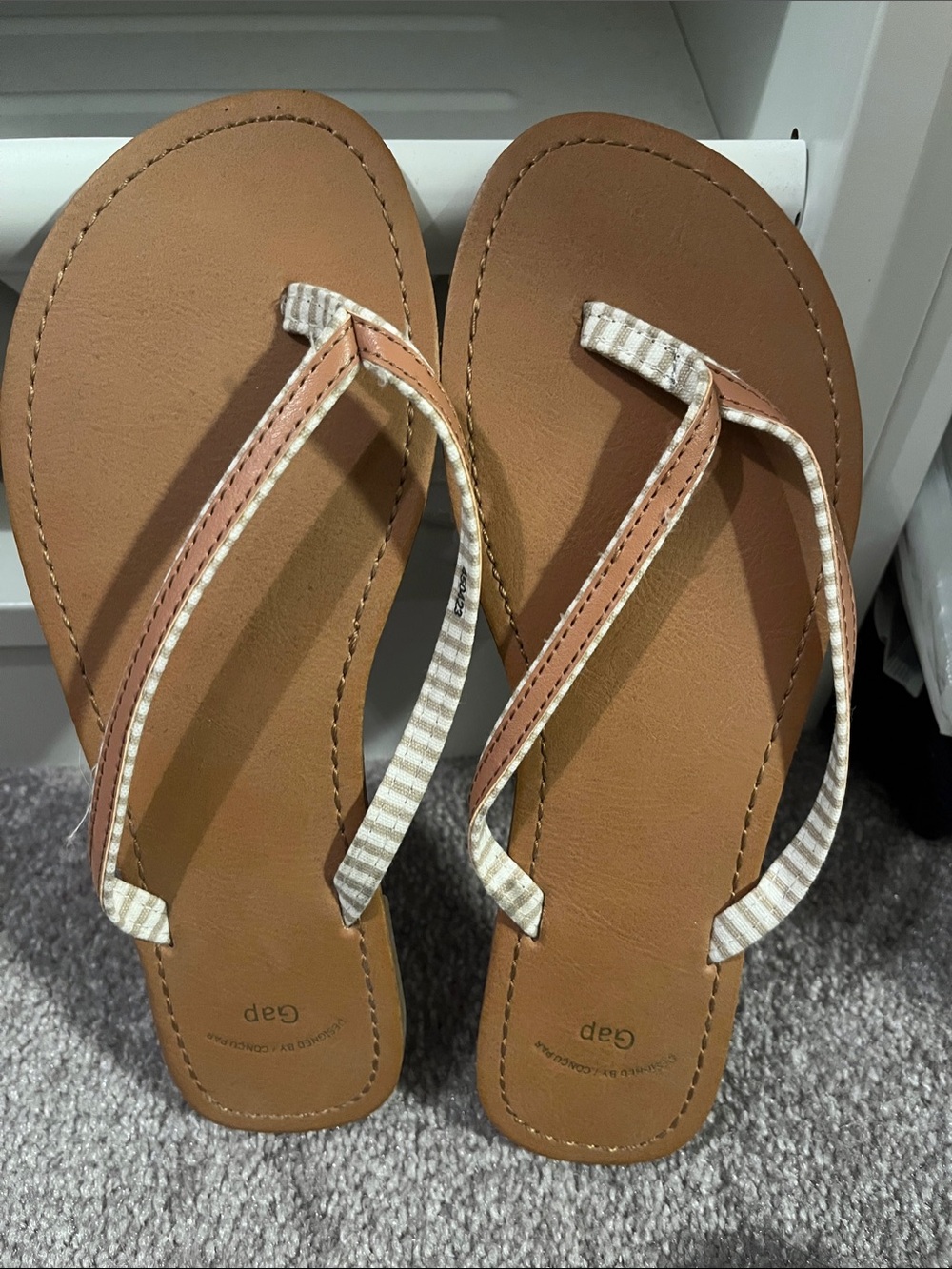 New (never worn) GAP Women’s Tan Flip Flops w/  Cream & Tan Striped Straps